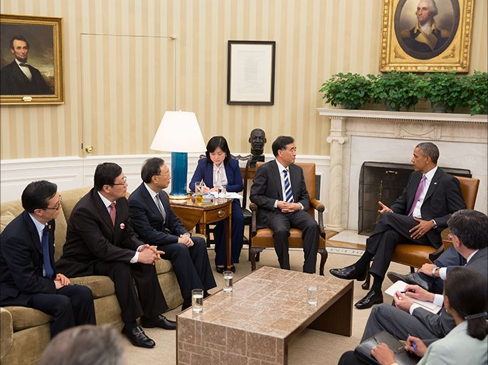 This official White House photograph shows US President Barack Obama meeting with Chinese Vice Premier Wang Yang and State Councilor Yang Jiechi in the Oval Office, July 11, 2013, in Washington, DC. AFP PHOTO / Official White House Photo by Pete Souza == RESTRICTED TO EDITORIAL USE / MANDATORY CREDIT: "AFP PHOTO / Official White House Photo by Pete Souza" / NO SALES / NO MARKETING / NO ADVERTISING CAMPAIGNS / DISTRIBUTED AS A SERVICE TO CLIENTS ==