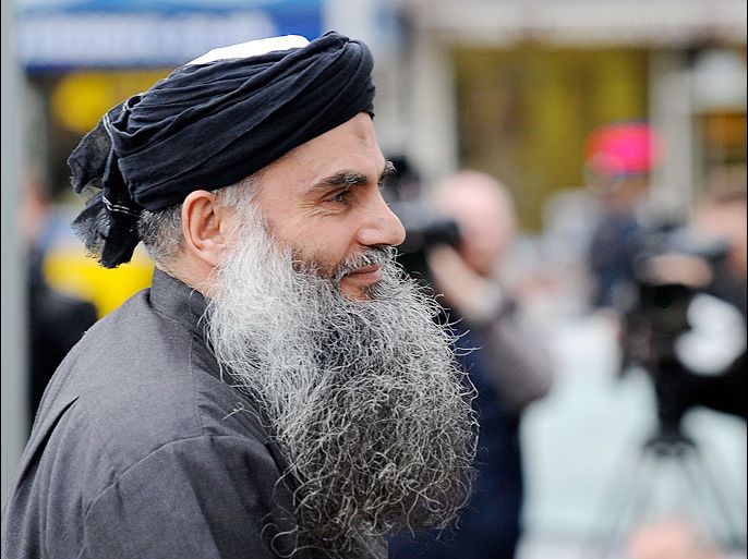 epa03771003 (FILE) A file photograph showing Muslim cleric Abu Qatada arriving at his home in north London after being freed on bail in London, England, 13 November 2012. Reports state on 02 July 2013 that the Jordanian government's Official Gazette printed the treaty between Britain and Jordan which clears the way for cleric Abu Qatada to be deported to Jordan. The agreement marks the latest twist in the case of Omar Oathman - also known as Abu Qatada - a hardline Muslim cleric who was sentenced to more than eight years in prison by a Jordanian court in 1999 in absentia for alleged ties to al-Qaeda. EPA/ANDY RAIN