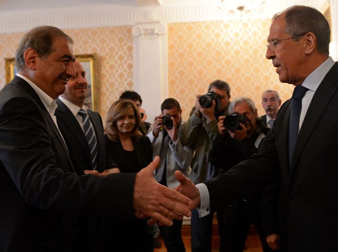KUD727 - Moscow, -, RUSSIAN FEDERATION : Russian Foreign Minister Sergei Lavrov (R) shakes hands with Syrian deputy Prime Minister Qadri Jamil during their meeting in Moscow, on July 22, 2013. AFP PHOTO/ KIRILL KUDRYAVTSEV