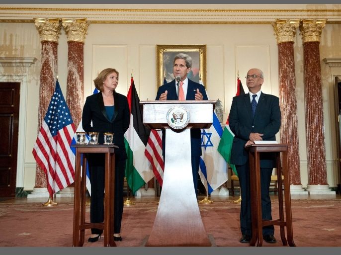 US Secretary of State John Kerry speaks to the press with chief Palestinian negotiator Saeb Erakat (R) and Israel's Justice Minister Tzipi Livni (L) at the State Department in Washington on July 30, 2013. Israeli and Palestinian officials are meeting for a second day of direct talks as they resume negotiations for the first time in three years groping for an elusive peace deal.