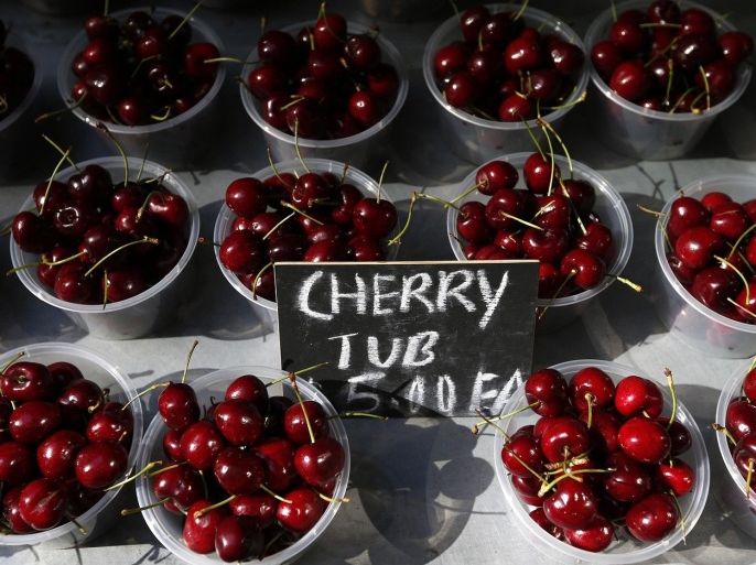 Cherry packs are sold at A$ 5 ($4.45), at a fruit store in central Sydney August 5, 2013. As Australia contemplates life on the other side of the mining boom, the onus is very much on the country's central bank to prop up the economy by taking interest rates to historic lows and likely keep them there for a long time to come.