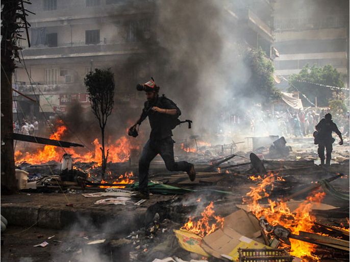 صور أحداث فض إعتصام رابعة العدوية