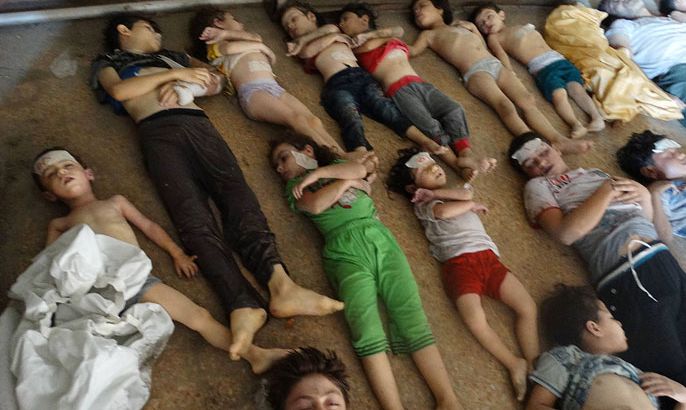 ATTENTION EDITORS - VISUALS COVERAGE OF SCENES OF DEATH AND INJURY A view shows bodies of children activists say were killed by nerve gas in the Ghouta region, in the Duma neighbourhood of Damascus August 21, 2013 in this handout provided by Shaam News Network. Syrian activists accused President Bashar al-Assad's forces of launching a nerve gas attack on rebel-held districts near Damascus on Wednesday that they said killed more than 200 people. There was no immediate comment from Syrian authorities, who have denied using chemical weapons during the country's two-year conflict, and have accused rebels of using them, which the rebels deny. REUTERS/Mohamed al-Abdullah/Shaam News Network/Handout via Reuters (SYRIA - Tags: CONFLICT CIVIL UNREST) ATTENTION EDITORS - THIS PICTURE WAS PROVIDED BY A THIRD PARTY. REUTERS IS UNABLE TO INDEPENDENTLY VERIFY THE AUTHENTICITY, CONTENT, LOCATION OR DATE OF THIS IMAGE. FOR EDITORIAL USE ONLY. NOT FOR SALE FOR MARKETING OR ADVERTISING CAMPAIGNS. NO SALES. NO ARCHIVES. THIS PICTURE IS DISTRIBUTED EXACTLY AS RECEIVED BY REUTERS, AS A SERVICE TO CLIENTS. TEMPLATE OUT