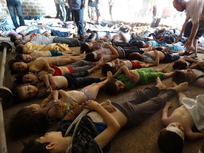 ‪‬ من ضحايا هجمات قوات الأسد بالأسلحة الكيميائية على المدنيين والأطفال(رويترز)