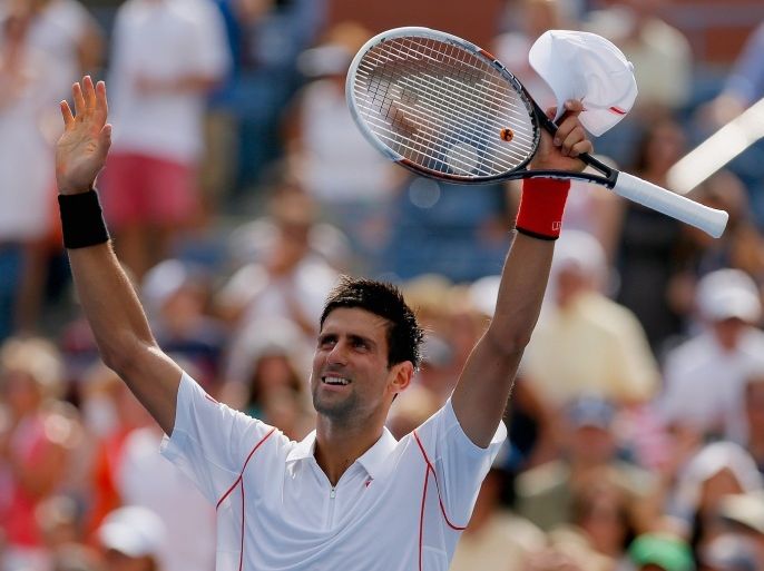 NEW YORK, NY - AUGUST 30: Novak Djokovic of Serbia celebrates victory after his men's singles second round match against Benjamin Becker of Germany on Day Five of the 2013 US Open at the USTA Billie Jean King National Tennis Center on August 30, 2013 in New York City.