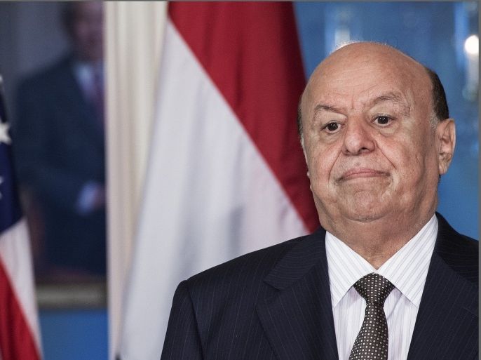 Yemeni President Abdo Rabbo Mansour Hadi listens to the translation in the Treaty Room of the State Department as he and US Secretary of State Kerry deliver remarks to the media after they conducted a bilateral meeting on July 29, 2013, in Washington.