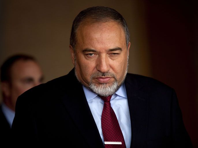 epa03444701 Israeli Foreign Minister Avigdor Lieberman awaits the arrival of European Union High Representative for Foreign Policy and Security Affairs Catherine Ashton (unseen) for a meeting at his office in Jerusalem, Israel, 24 October 2012. Ashton is in the region to hold talks with Israeli and Palestinian officials. EPA/ABIR SULTAN