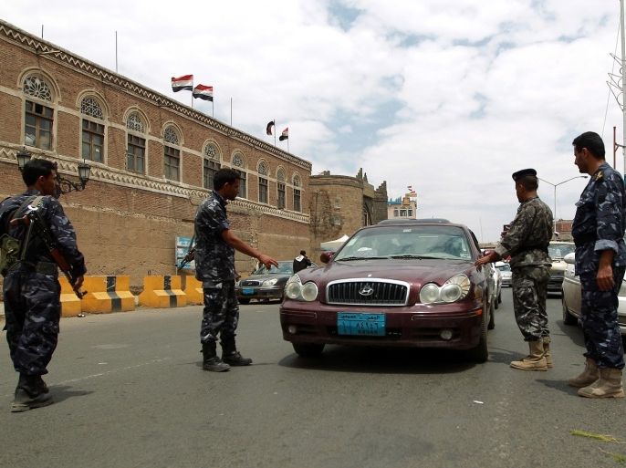 Yemeni soldiers man a checkpoint in the capital Sanaa on September 20, 2013 after suspected Al-Qaeda fighters killed at least 56 soldiers and police in a wave of dawn attacks, the deadliest day for Yemeni security forces since jihadist strongholds fell last year.
