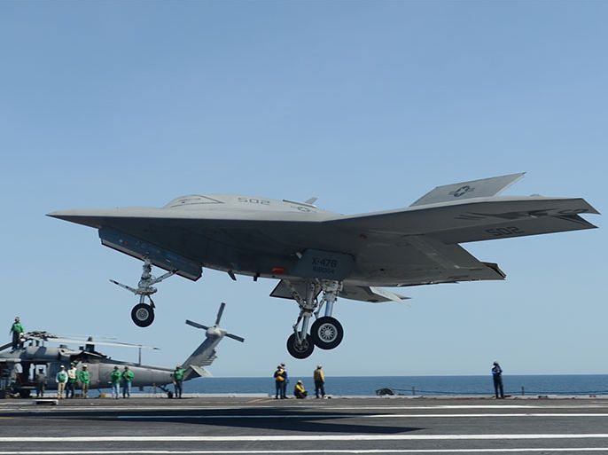 A US Navy Handout shows An X-47B unmanned combat air system (UCAS) demonstrator prepares to execute a touch and go landing on the flight deck of the aircraft carrier USS George H.W. Bush (CVN 77), on 17 May 2013. This is the first time any unmanned aircraft has completed a touch and go landing at sea. George H.W. Bush is conducting training operations in the Atlantic Ocean. EPA/MC2 Timothy Walter / U.S. Navy HANDOUT Released/Distributed by Navy Media Content Service