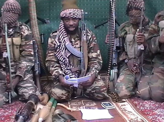 A screengrab taken on September 25, 2013 from a video distributed through an intermediary to local reporters and seen by AFP, shows a man claiming to be the leader of Nigerian Islamist extremist group Boko Haram Abubakar Shekau. The video, which comes after an outburst of violence in northeastern Nigeria, shows the man taunting world leaders after the military said he may have been killed.