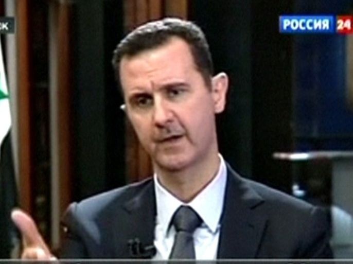 Syria's President Bashar al-Assad speaks during an interview in Damascus in this image from a September 12, 2013 video footage by Russian state television RU24. Assad said Damascus will send in the next couple days documents to the United Nations and an anti-chemical arms body needed in order to join a convention that prohibits chemical weapons.