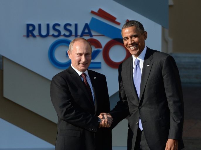 ST. PETERSBURG, RUSSIA - SEPTEMBER 05: In this handout image provided by Host Photo Agency, Russian President Vladimir Putin (L) greets U.S. President Barack Obama at the G20 summit on September 5, 2013 in St. Petersburg, Russia. The G20 summit is expected to be dominated by the issue of military action in Syria while issues surrounding the global economy, including tax avoidance by multinationals, will also be discussed during the two-day summit.