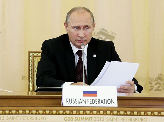 epa03852248 Russian President Vladimir Putin attends the first working session of the G20 Summit in Constantine Palace in Strelna near St. Petersburg, Russia, 05 September 2013. EPA/SERGEI KARPUKHIN/POOL