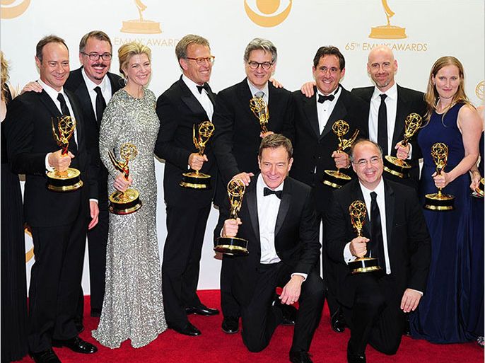 TOPSHOTSActor Bryan Cranston (C) and members of 'Breaking Bad' pose in the press room on September 22, 2013 during the 65th Annual Primetime Emmy Awards in Los Angeles, California. AFP PHOTO/Frederic J. BROWN