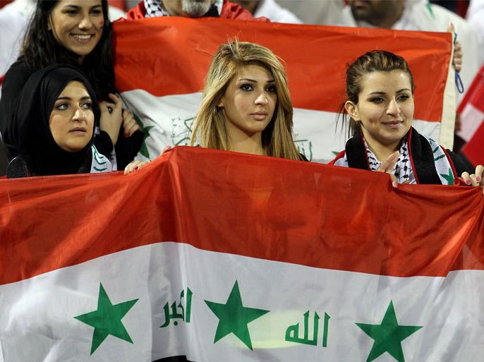epa02525069 Iraq fans support their team before the AFC Asian Cup Qatar 2011 group D soccer match between Iran and Iraq at Al-Rayyan sports club stadium in Doha, Qatar, 11 January 2011. EPA/MOHAMED FARAG