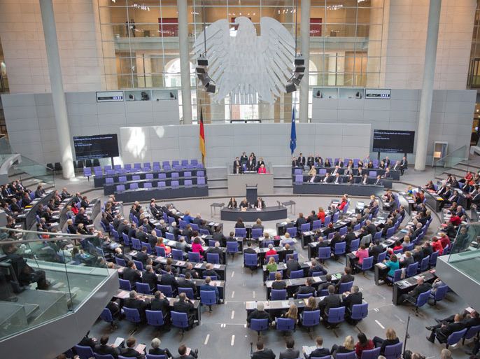 Chairman by seniority Heinz Riesenhuber (C, standing) presides over the Bundestag at the start of the new legislative period at the Reichstag building in Berlin, Germany, 22 October 2013. The German 'Bundestag' parliament met 22 October for the first time since general election in September 2013. The meeting of the 631-strong Bundestag comes a day before Chancellor Angela Merkel is due to lead the first round of negotiations with the main opposition Social Democrats to forge a new coalition government. Merkel's conservative Christian Democrats (CDU) and its Bavarian-based associate party, the Christian Social Union (CSU), emerged as the biggest bloc in the election with 311 seats in parliament. EPA/MICHAEL KAPPELER