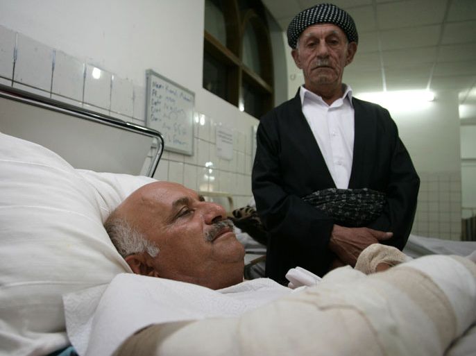 Arbil, -, IRAQ : A Iraqi Kurdish man lies on a bed after he was treated at a hospital in the capital of Iraq's autonomous Kurdish Arbil on September 30, 2013 following a car bomb attack the day before. Militants killed six people in Arbil on September 29 in a rare attack on an area usually spared the violence plaguing other parts of the country. AFP PHOTO / SAFIN HAMED