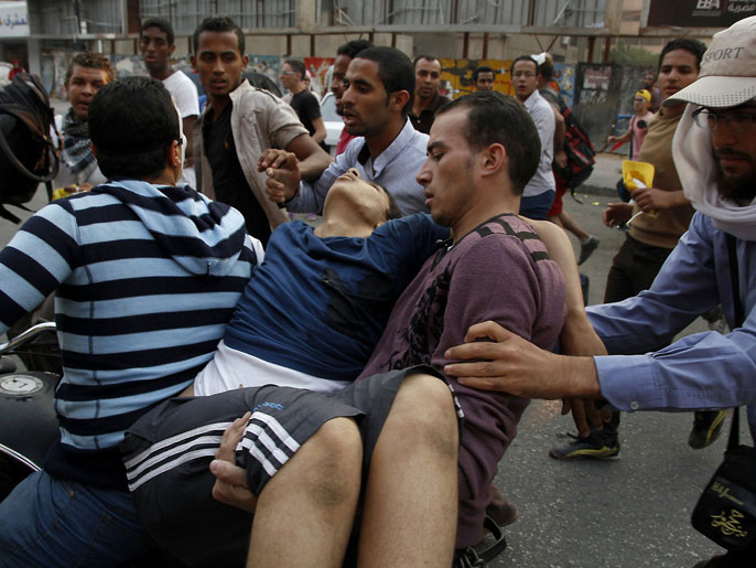 ‪قوات الأمن أطلقت النار على متظاهرين مما أوقع قتيلا في حي مدينة نصر‬ (الفرنسية)