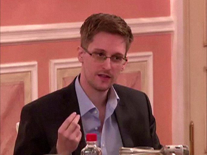 An image grab taken from a video released by Wikileaks on October 12, 2013 shows US intelligence leaker Edward Snowden speaking during a dinner with US ex-intelligence workers and activists in Moscow on October 9, 2013. Snowden warned of dangers to democracy in the first video released of the fugitive since Russia granted him temporary asylum in August. AFP PHOTO / WIKILEAKS