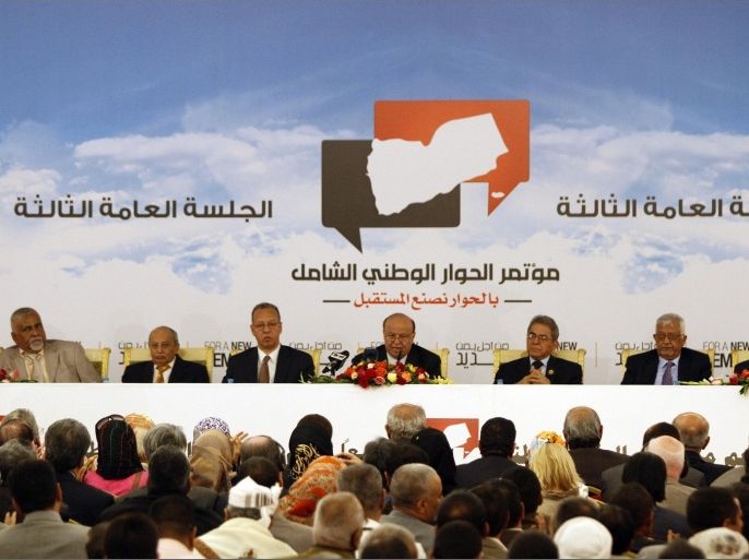 Yemen's President Abd-Rabbu Mansour Hadi (C) speaks during the third plenary meeting of a national dialogue conference in Sanaa October 8, 2013.