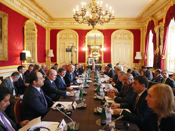Arab and Western Foreign ministers hold the "London 11" meeting from the Friends of Syria Core Group at Lancaster House in London on October 22, 2013. Arab and Western powers met in London to push Syrian oppsition leaders to attend talks in Geneva next month, but President Bashar al-Assad poured cold water on hopes of any peace deal. AFP PHOTO/POOL/OLI SCARFF