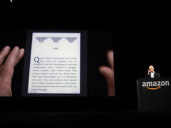 FILE - In this Thursday, Sept. 6, 2012, file photo, Jeff Bezos, CEO and founder of Amazon, at the introduction of the new Amazon Kindle Fire HD and Kindle Paperwhite personal devices, in Santa Monica, Calif. On the heels of Apple's new, lighter iPad, Amazon has come out with a full-size tablet that weighs even less yet sports a sharper display and a lower price tag. (AP Photo/Reed Saxon)