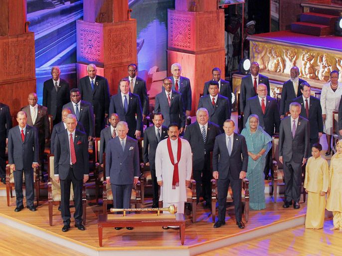 In this handout photograph released by The Sri Lankan Presidency on November 15, 2013 some of the Heads of State of the Commonwealth stand during the opening ceremony at the Commonwealth Heads of Government Meeting (CHOGM) summit in Colombo. Britain's Prime Minister David Cameron made an historic visit to Sri Lanka's former war-zone, stealing the spotlight from a Commonwealth summit after the host, President Mahinda Rajapakse, warned against passing judgement on his country's past. AFP