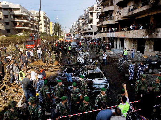 epa03956427 A general view shows the damage at the scene of two suicide explosions near the Iranian embassy in south Beirut, Lebanon, 19 November 2013. According to the Lebanese Health Ministry, 23 people were killed and 146 injured in a double suicide bombing near the Iranian embassy in Beirut. An Iranian cultural envoy to Lebanon has died of injuries sustained in the bombings. EPA/NABIL MOUNZER
