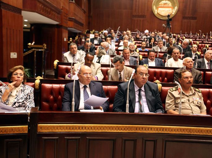 epa03859258 A general view shows members of the committee revising the country's controversial constitution, during their meeting in Cairo, Egypt, 09 September 2013. The 50-member panel held the first meeting on 08 September to look at amendments to a constitution backed by Islamists last year. Amending the constitution, crafted by an Islamist-dominated assembly and ratified by a referendum in 2012, is a key step in the roadmap announced by the army in July, following its overthrow of president Mohamed Morsi of the Muslim Brotherhood EPA/KHALED ELFIQI