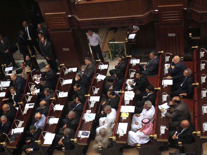 epa03857676 A general view shows members of the committee revising the country's controversial constitution, during their first meeting in Cairo, Egypt, 08 September 2013. The 50-member panel held the first meeting on 08 September to look at amendments to a constitution backed by Islamists last year. Amending the constitution, crafted by an Islamist-dominated assembly and ratified by a referendum in 2012, is a key step in the roadmap announced by the army in July, following its overthrow of president Mohamed Morsi of the Muslim Brotherhood. EPA/STR