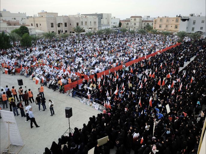 Bahraini protesters take part in an anti-government protest in the village of Saar, west of Manama, on December 6, 2013. AFP PHOTO/MOHAMMED AL-SHAIKH
