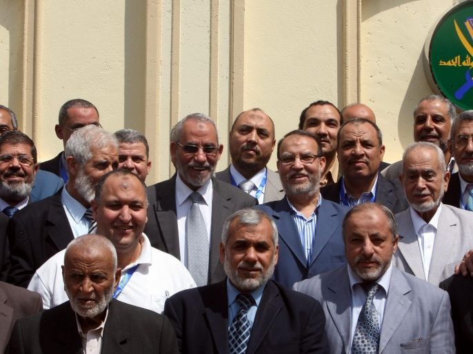 (FILE) A file photo dated 30 April 2011 shows the then Egypt's Muslim Brotherhood Supreme Guide Mohammed Badie (3rd row, 3-L) standing amongst members of the group's Shura Council as they pose for a group photo after their meeting in Cairo, Egypt. Egyptian state television reported on 25 December 2013 that the Egyptian government has labeled the Muslim Brotherhood a terrorist group. The government on 24 December blamed the Muslim Brotherhood for the attack that targeted a regional police headquarters in northern Egypt which killed 15 people and injured more than 130.
