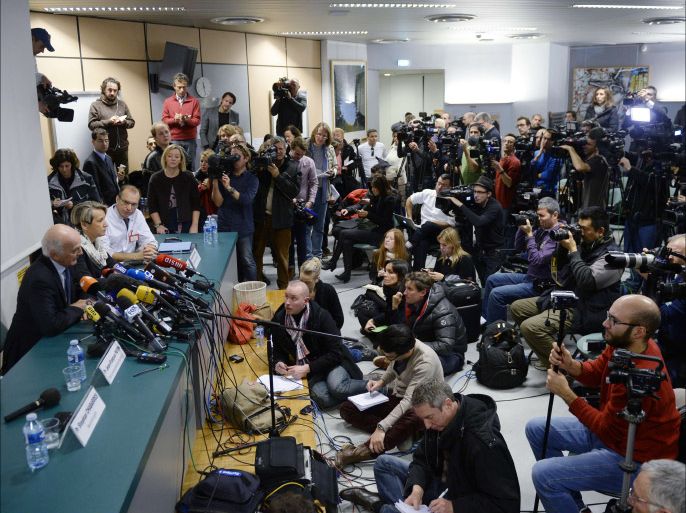 French surgeon and Michael Schumacher's friend professor Gerard Saillant (L) speaks next to director Jacqueline Hubert (C) and neurosurgeon chief Emmanuel Gay (R) during a press conference about Michael Schumacher's health condition