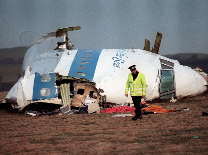 lockerbie, Scotland, UNITED KINGDOM : A file picture taken in Lockerbie, Scotland, on December 22, 1988, shows the wreckage of Pan Am flight 103 aircraft that exploded killing all 259 people aboard. British Prime Minister David Cameron on Saturday December 21, 2013, expressed Britain's "unconditional admiration" for the families of the victims of the Lockerbie bombing on the attack's 25th anniversary. AFP PHOTO / ROY LETKEY/FILES