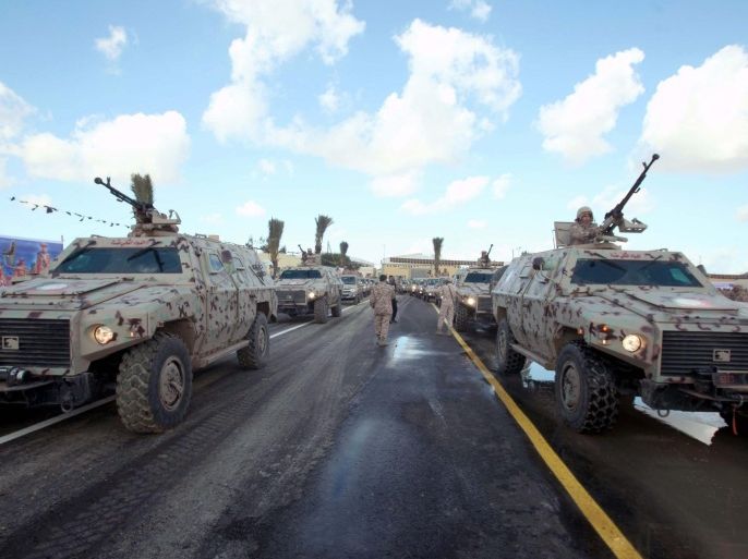 Libyan soldiers on their vehicles takes part in a military parade during a graduation ceremony for a new batch of Libyan National Army, in Tripoli, Libya, 16 January 2014.