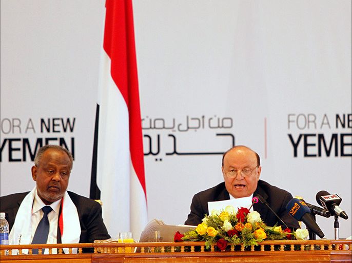 Yemen's President Abd-Rabbu Mansour Hadi (C) speaks during the closing ceremony of the national dialogue conference in Sanaa January 25, 2014. REUTERS/Mohamed al-Sayaghi (YEMEN - Tags: POLITICS)