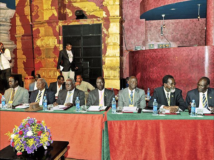 South Sudanese government representatives attend peace talks on the fighting in South Sudan on January 13, 2014