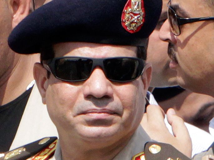 Army Chief General Abdel Fattah al-Sisi attends the military funeral service of police General Nabil Farag, who was killed on Thursday in Kerdasa, at Al-Rashdan Mosque in Cairo's Nasr City district in this September 20, 2013 file photo. Egyptian army chief General Abdel Fattah al-Sisi has been promoted to the rank of field marshal, the presidency said on January 27, 2014, fuelling speculation he is about to retire from the military and run for president. REUTERS