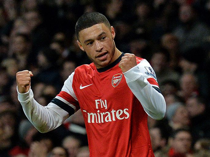 Arsenal's English midfielder Alex Oxlade-Chamberlain celebrates after scoring his second goal during the English Premier League football match between Arsenal and Crystal Palace at the Emirates Stadium in London on February 2, 2014. AFP