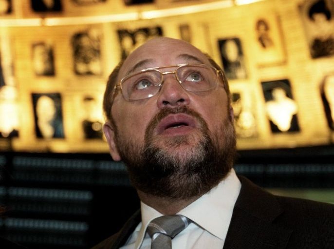 President of the European Parliament Martin Schultz visits the Hall of Names, which commemorates the six million Jews killed by the Nazis during World War II, at the Yad Vashem Holocaust memorial museum in Jerusalem on February 11 2014, during his official to Israel. AFP PHOTO/MENAHEM KAHANA