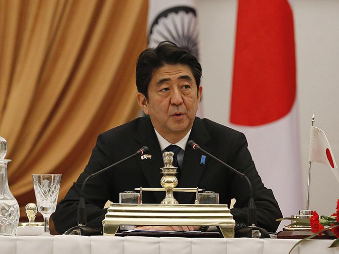 epa04041324 Japanese Prime Minster Shinzo Abe is pictured during a press conference with Indian Prime Minister Manmohan Singh (not seen) after signing a joint agreement following a meeting in New Delhi, India, 25 January 2014