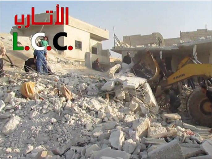 الأتارب - آثار قصف الطيران المروحي المدينة 19/2 /2014