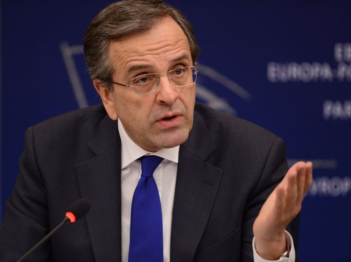 epa04022335 Greek Prime Minister Antonis Samaras gestures during a press conference in the European Parliament in Strasbourg, France, 15 January 2014. Greece assumed the European Union's rotating six-month presidency on 08 January 2014. EPA/PATRICK SEEGER