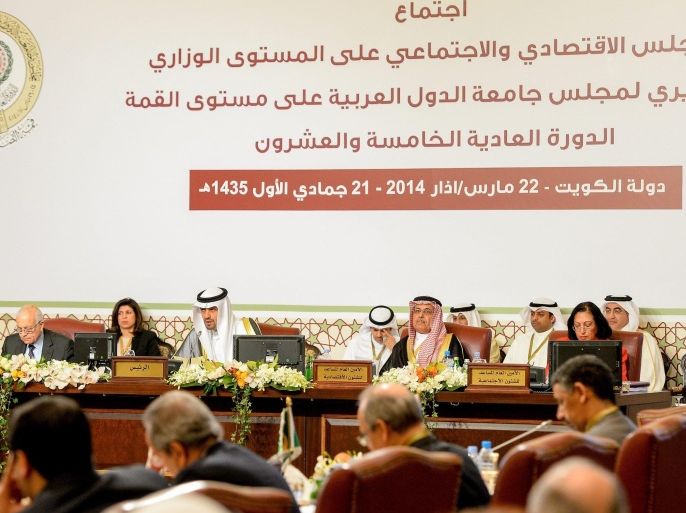 Kuwaiti Minister of Finance Anas Al-Saleh (C) speaks at the Arab finance ministers' opening session of the Economic and Social Council of the Arab League ministers, ahead of the 25th Arab summit, in Kuwait, 22 March 2014.
