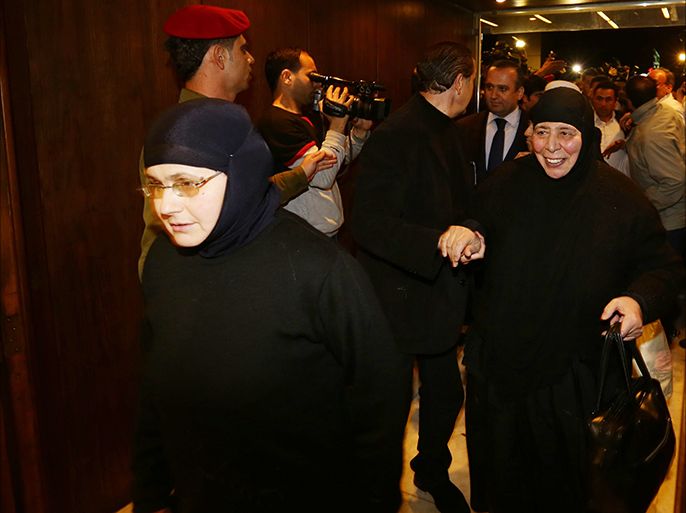Kidnapped nuns arrive at Jdeidet Yabus on the Syrian side of the border with Lebanon after an arduous nine-hour journey that took them from Yabrud into Lebanon, and then back into Syria on March 10, 2014. A group of nuns kidnapped by rebels in the Syrian town of Maalula in December were released early Monday thanks to Lebanese-Qatari mediation and handed to the Syrian authorities. A monitoring group said the release was secured in exchange for some 150 women prisoners who were being held in Syria's regime jails.AFP PHOTO / LOUAI BESHARA