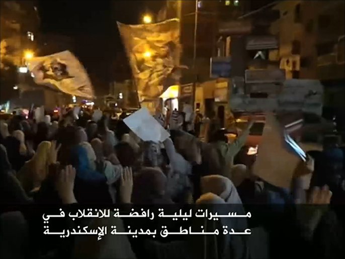 مسيرة ليلية سابقة في الإسكندرية احتجاجا على ترشح السيسي (الجزيرة)