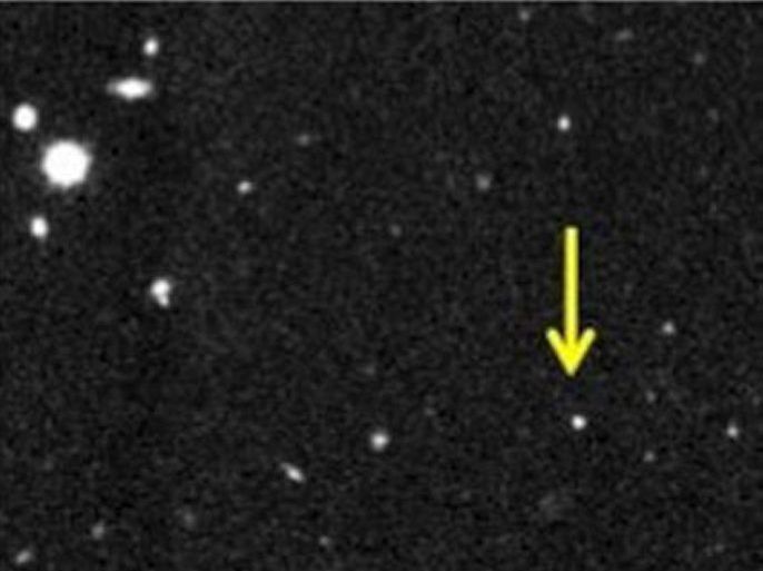 This combination of images provided by the Carnegie Institution for Science shows a new solar system object dubbed 2012 VP113, indicated by the yellow arrow, that was observed on November 2012 through a telescope in Chile. New research published in the journal Nature reveals it’s the second object to be discovered in the far reaches of the solar system far beyond the orbit of Pluto. (AP Photo/Carnegie Institution for Science, Scott S. Sheppard)