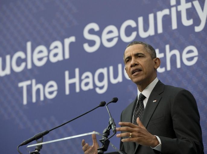 President Barack Obama speaks during their joint news conference with Dutch Prime Minister Mark Rutte at the conclusion of the Nuclear Security Summit in The Hague, Netherlands, Tuesday, March 25, 2014. (AP Photo/Pablo Martinez Monsivais)
