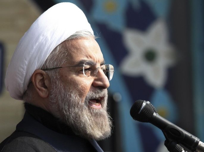 File-This Feb. 11, 2014, file photo shows Iranian President Hassan Rouhani, delivering a speech during an annual rally commemorating anniversary of the 1979 Islamic revolution, at the Azadi 'Freedom' Square in Tehran, Iran. Iran's president says the Islamic Republic rejects the manufacture of nuclear weapons out of principle, not because it is prevented so by treaties. Rouhani also said that, had Iran wanted weapons of mass destruction, it would be easier for it to make chemical or biological weapons. He made the comments Saturday, March 1, 2014, while addressing Iran's defense ministry officials. (AP Photo/Vahid Salemi, File)