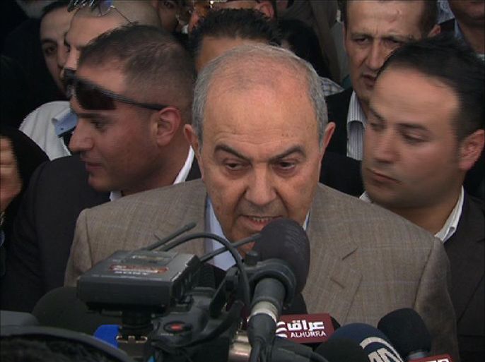 اياد علاوي يتحدث للصحفيين قبيل الادلاء بصوته في عمان اليوم